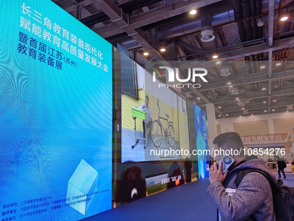 Visitors are attending the first Jiangsu (Suzhou) Educational Equipment Exhibition in Suzhou, Jiangsu Province, China, on December 15, 2023....