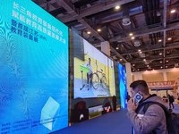 Visitors are attending the first Jiangsu (Suzhou) Educational Equipment Exhibition in Suzhou, Jiangsu Province, China, on December 15, 2023....