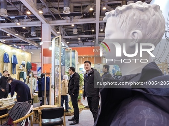 Visitors are attending the first Jiangsu (Suzhou) Educational Equipment Exhibition in Suzhou, Jiangsu Province, China, on December 15, 2023....