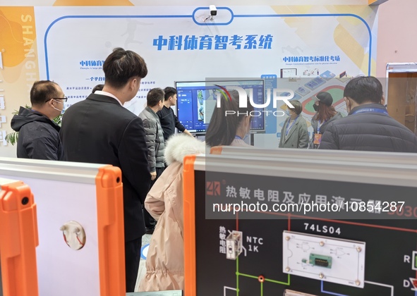 Visitors are attending the first Jiangsu (Suzhou) Educational Equipment Exhibition in Suzhou, Jiangsu Province, China, on December 15, 2023....