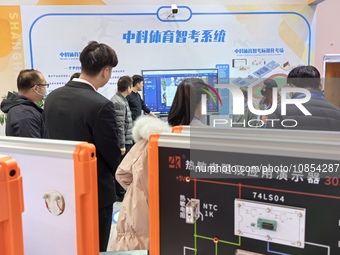 Visitors are attending the first Jiangsu (Suzhou) Educational Equipment Exhibition in Suzhou, Jiangsu Province, China, on December 15, 2023....