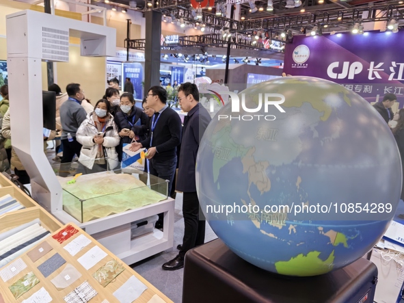 Visitors are attending the first Jiangsu (Suzhou) Educational Equipment Exhibition in Suzhou, Jiangsu Province, China, on December 15, 2023....