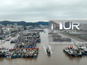 A large number of fishing boats are taking shelter at Shenjiamen fishing port in Zhoushan, Zhejiang Province, China, on December 15, 2023. (