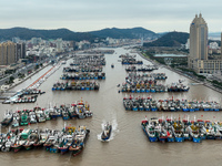 A large number of fishing boats are taking shelter at Shenjiamen fishing port in Zhoushan, Zhejiang Province, China, on December 15, 2023. (