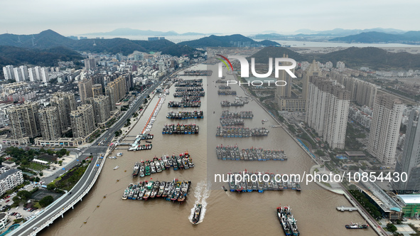 A large number of fishing boats are taking shelter at Shenjiamen fishing port in Zhoushan, Zhejiang Province, China, on December 15, 2023. 