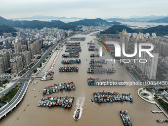 A large number of fishing boats are taking shelter at Shenjiamen fishing port in Zhoushan, Zhejiang Province, China, on December 15, 2023. (