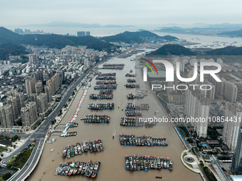 A large number of fishing boats are taking shelter at Shenjiamen fishing port in Zhoushan, Zhejiang Province, China, on December 15, 2023. (