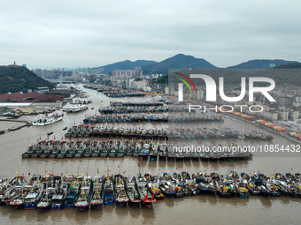 A large number of fishing boats are taking shelter at Shenjiamen fishing port in Zhoushan, Zhejiang Province, China, on December 15, 2023. (