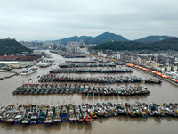 A large number of fishing boats are taking shelter at Shenjiamen fishing port in Zhoushan, Zhejiang Province, China, on December 15, 2023. (