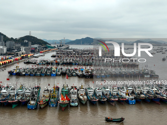 A large number of fishing boats are taking shelter at Shenjiamen fishing port in Zhoushan, Zhejiang Province, China, on December 15, 2023. (