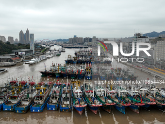 A large number of fishing boats are taking shelter at Shenjiamen fishing port in Zhoushan, Zhejiang Province, China, on December 15, 2023. (