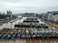 A large number of fishing boats are taking shelter at Shenjiamen fishing port in Zhoushan, Zhejiang Province, China, on December 15, 2023. (