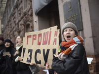Demonstrators are demanding an increase in financial support for the Armed Forces of Ukraine outside the Kyiv City State Administration buil...