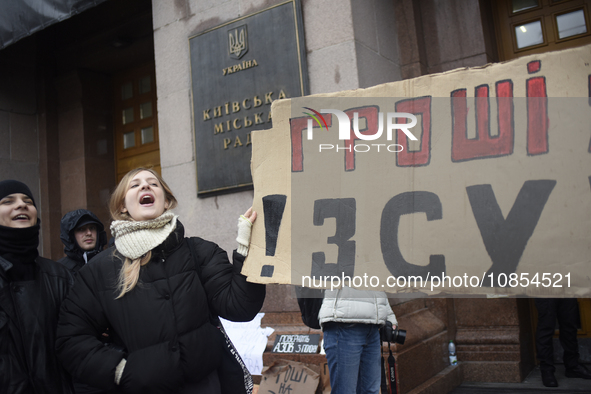 Demonstrators are demanding an increase in financial support for the Armed Forces of Ukraine outside the Kyiv City State Administration buil...