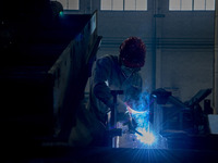 A worker is working at a workshop of a manufacturing enterprise in Hai'an, Jiangsu Province, China, on December 14, 2023. (