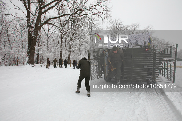 Servicemen are getting out of an APC while senior sergeants from the units of the Eastern Operational and Territorial Command of the Nationa...