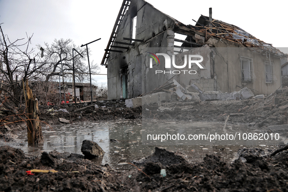 A residential building is being damaged by Russian shelling in the Odesa Region, southern Ukraine, on December 17, 2023. 