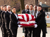 The casket of retired Associate Justice Sandra Day O’Connor, the first woman to serve on the Supreme Court, arrives at the Court to lie in r...