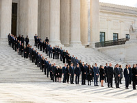 The former law clerks of retired Associate Justice Sandra Day O’Connor, the first woman to serve on the Supreme Court, await her casket as s...