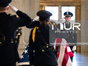 Supreme Court Police officers salute retired Associate Justice Sandra Day O’Connor, the first woman to serve on the Supreme Court, during a...