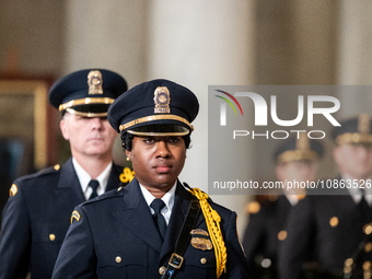 An honor guard of Supreme Court Police officers changes as retired Associate Justice Sandra Day O’Connor, the first woman to serve on the Su...