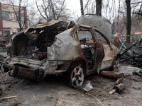 In Kyiv, Ukraine, on December 18, 2023, a burnt-out car is being seen in the yard of a residential building at 4A Ostafiia Dashkevycha Stree...