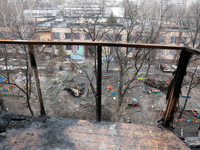 A view from a burnt-out balcony in Anatolii Luchok's apartment is showing the yard after the residential building at 4A Ostafiia Dashkevycha...