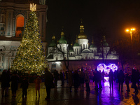 The main Christmas tree of Ukraine, crowned by the national coat of arms, is standing in Sofiiska Square outside Saint Sophia Cathedral in K...