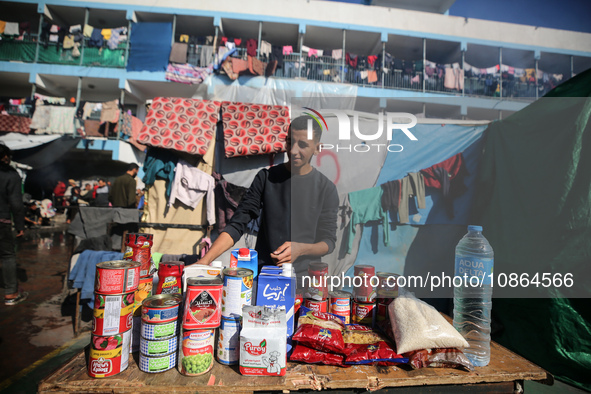 Displaced Palestinians are taking shelter in a UNRWA-affiliated Deir al-Balah school after fleeing their homes due to Israeli strikes, amid...