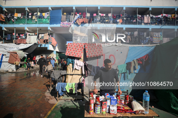 Displaced Palestinians are taking shelter in a UNRWA-affiliated Deir al-Balah school after fleeing their homes due to Israeli strikes, amid...