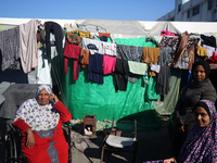 Displaced Palestinians are taking shelter in a UNRWA-affiliated Deir al-Balah school after fleeing their homes due to Israeli strikes, amid...