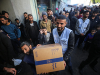 Displaced Palestinians are taking shelter in a UNRWA-affiliated Deir al-Balah school after fleeing their homes due to Israeli strikes, amid...