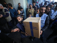 Displaced Palestinians are taking shelter in a UNRWA-affiliated Deir al-Balah school after fleeing their homes due to Israeli strikes, amid...