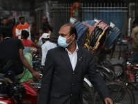 People are wearing protective masks in Dhaka, Bangladesh, on December 20, 2023, as a new Covid variant has been found in Kerala, India. (