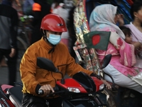 People are wearing protective masks in Dhaka, Bangladesh, on December 20, 2023, as a new Covid variant has been found in Kerala, India. (