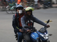 People are wearing protective masks in Dhaka, Bangladesh, on December 20, 2023, as a new Covid variant has been found in Kerala, India. (