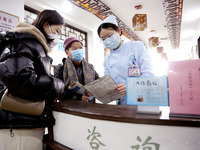 People are posting ''Sanjiu stickers'' at the Traditional Chinese Medicine Hall of Oriental Hospital in Lianyungang, East China's Jiangsu pr...