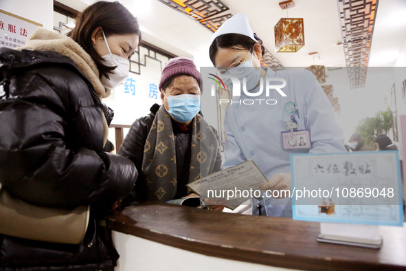 People are posting ''Sanjiu stickers'' at the Traditional Chinese Medicine Hall of Oriental Hospital in Lianyungang, East China's Jiangsu pr...