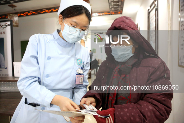 People are posting ''Sanjiu stickers'' at the Traditional Chinese Medicine Hall of Oriental Hospital in Lianyungang, East China's Jiangsu pr...