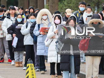 Candidates are preparing for the 2024 national postgraduate entrance examination at the test center of Nanjing Forestry University in Nanjin...