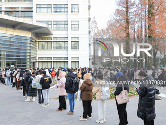 Candidates are preparing for the 2024 national postgraduate entrance examination at the test center of Nanjing Forestry University in Nanjin...