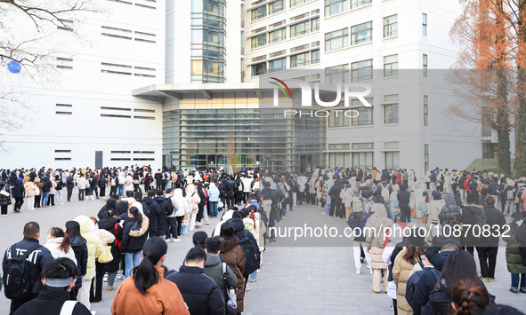 Candidates are preparing for the 2024 national postgraduate entrance examination at the test center of Nanjing Forestry University in Nanjin...