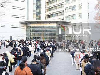 Candidates are preparing for the 2024 national postgraduate entrance examination at the test center of Nanjing Forestry University in Nanjin...