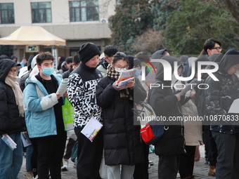 Candidates are preparing for the 2024 national postgraduate entrance examination at the test center of Nanjing Forestry University in Nanjin...