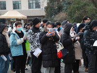 Candidates are preparing for the 2024 national postgraduate entrance examination at the test center of Nanjing Forestry University in Nanjin...