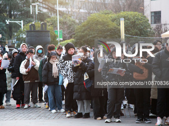 Candidates are preparing for the 2024 national postgraduate entrance examination at the test center of Nanjing Forestry University in Nanjin...