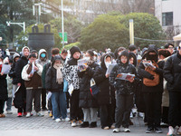 Candidates are preparing for the 2024 national postgraduate entrance examination at the test center of Nanjing Forestry University in Nanjin...