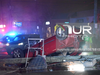 A vehicle is overturning and crashing into a pole in Bergenfield, New Jersey, United States, on December 27, 2023. The vehicle is overturnin...