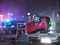 A vehicle is overturning and crashing into a pole in Bergenfield, New Jersey, United States, on December 27, 2023. The vehicle is overturnin...