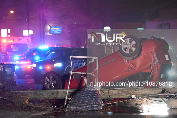 A vehicle is overturning and crashing into a pole in Bergenfield, New Jersey, United States, on December 27, 2023. The vehicle is overturnin...